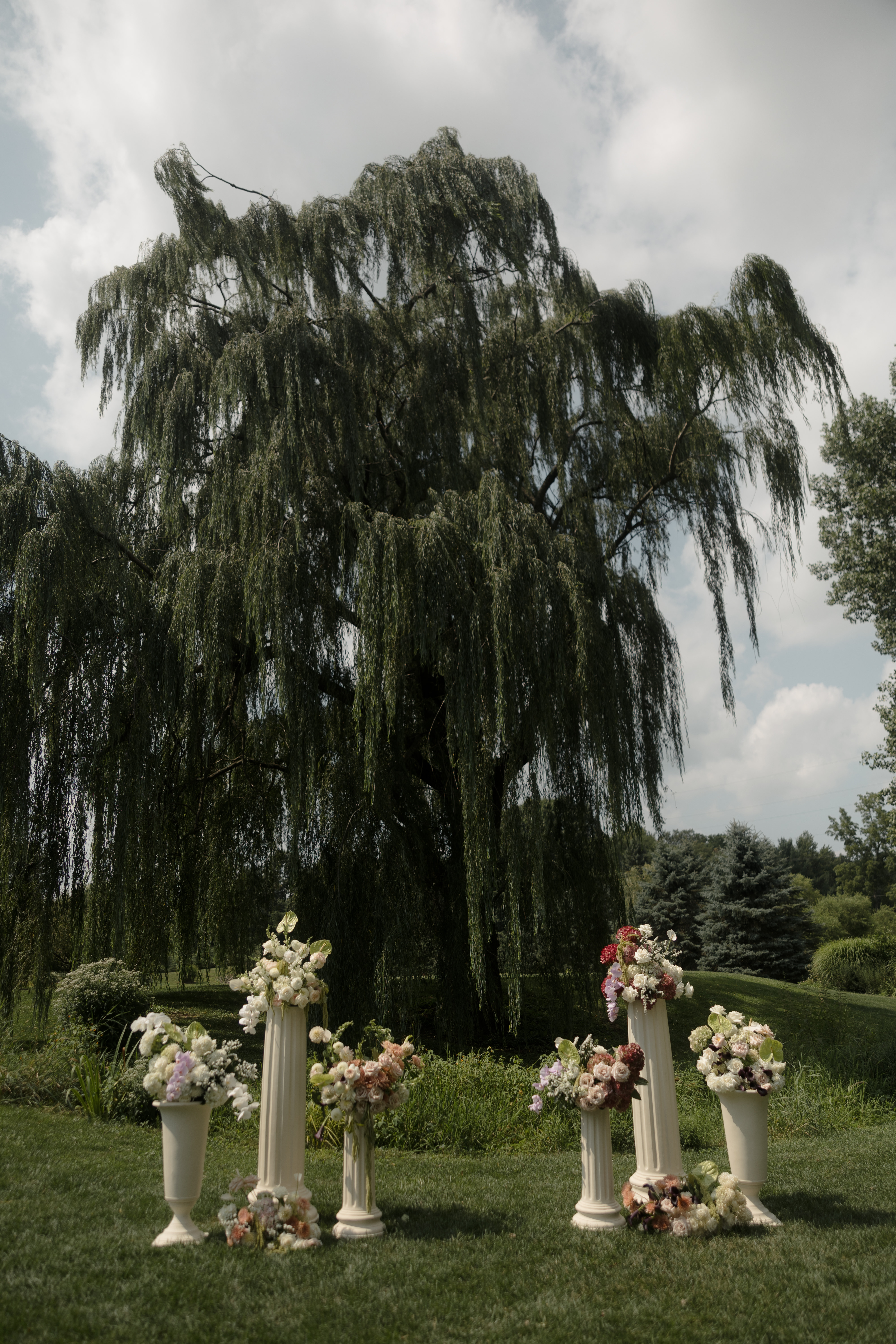 Wedding ceremony floral pedestals